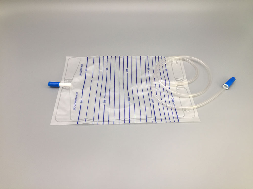 urine bag with pull-push valve